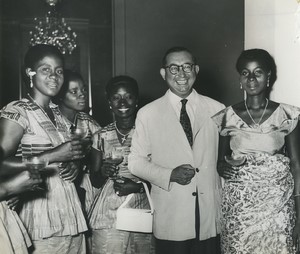 Africa? Group of women and a man at a reception? Old photo 1950